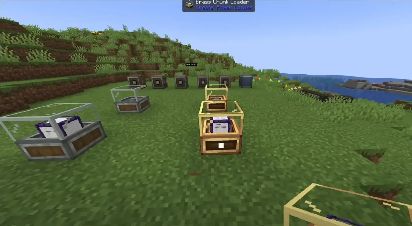 Блоки латунного загрузчика из мода Create Power Loader